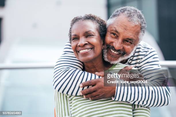 seniors . enjoying time together - senior couple stock pictures, royalty-free photos & images