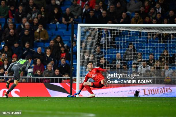 Real Sociedad's Spanish midfielder Ruben Pardo Gutierrez scores their second goal during the Spanish League football match between Real Madrid CF and...