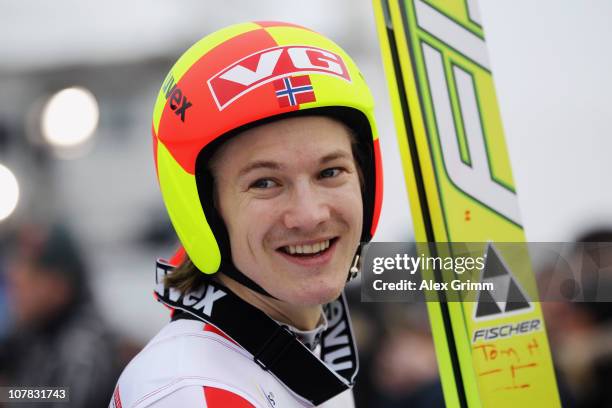 Tom Hilde Smiles after the qualification round for the FIS Ski Jumping World Cup event of the 59th Four Hills ski jumping tournament at...