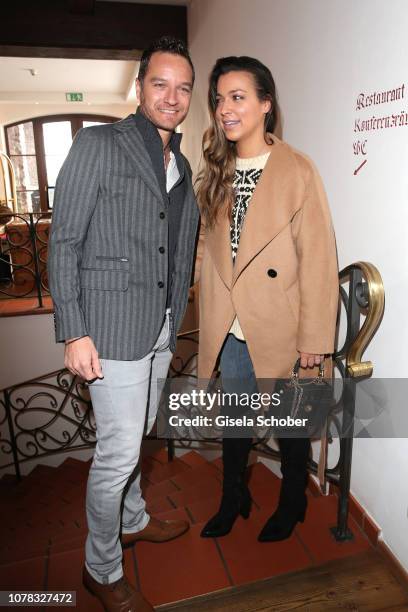 Jessica Hinterseer, daughter of Hansi Hinterseer and her fiance Timo Scheider during the Neujahrs- Karpfenessen at hotel Kitzhof on January 6, 2019...