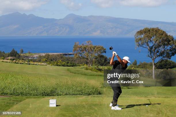 Jason Day of Australia plays his shot from the seventh tee during the final round of the Sentry Tournament of Champions at the Plantation Course at...