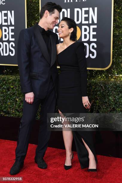 Best Performance by an Actor in a Television Series Musical or Comedy for "Kidding" nominee Jim Carrey and US actress Ginger Gonzaga arrive for the...