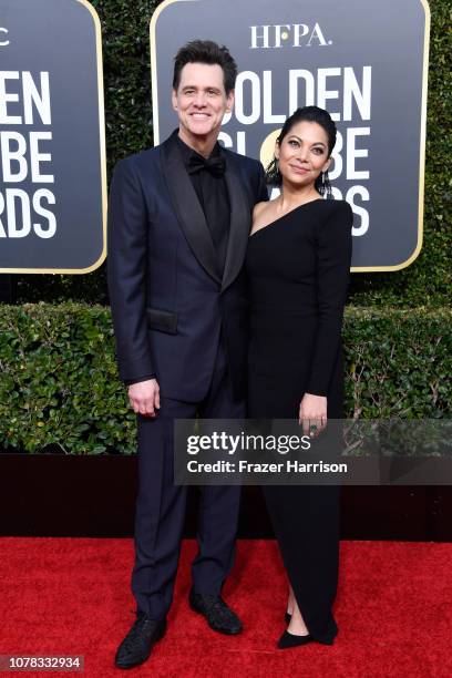 Jim Carrey and Ginger Gonzaga attend the 76th Annual Golden Globe Awards at The Beverly Hilton Hotel on January 6, 2019 in Beverly Hills, California.