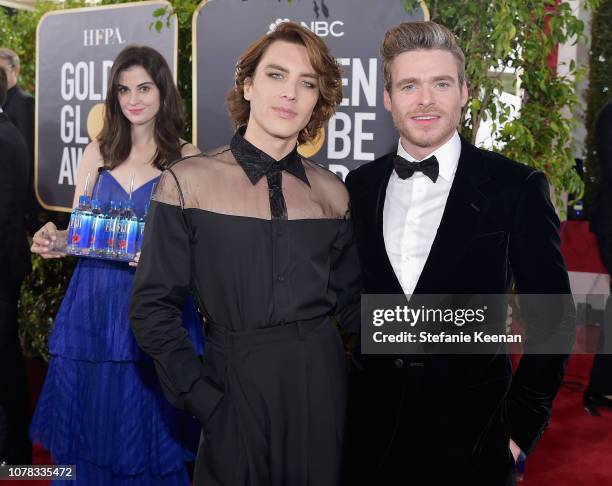 Cody Fern and Richard Madden attend FIJI Water at the 76th Annual Golden Globe Awards on January 6, 2019 at the Beverly Hilton in Los Angeles,...