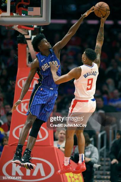 Jonathan Isaac of the Orlando Magic blocks a shot by Tyrone Wallace of the LA Clippers in the first half at Staples Center on January 6, 2019 in Los...