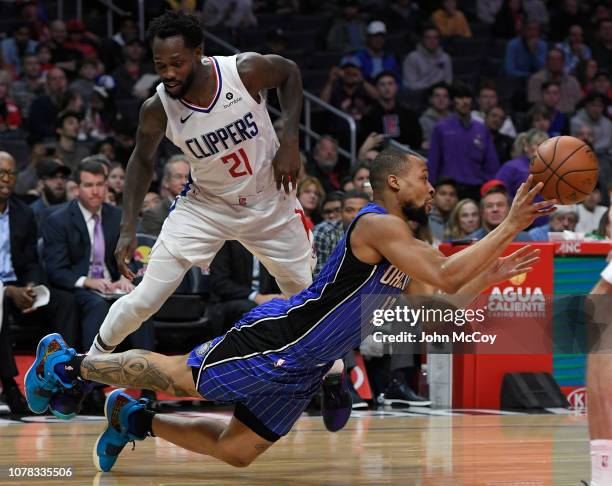 Patrick Beverley of the LA Clippers triped up Isaiah Briscoe of the Orlando Magic who attempted to pass the ball in the second quarter at Staples...