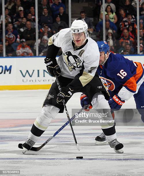Evgeni Malkin of the Pittsburgh Penguins skates against the New York Islanders at the Nassau Coliseum on December 29, 2010 in Uniondale, New York....