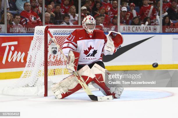 Goalie Olivier Roy of Canada makes a save during the 2011 IIHF World U20 Championship game between Canada and Sweden on December 31, 2010 at HSBC...