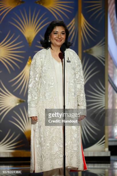 In this handout photo provided by NBCUniversal, Meher Tatna speaks onstage during the 76th Annual Golden Globe Awards at The Beverly Hilton Hotel on...