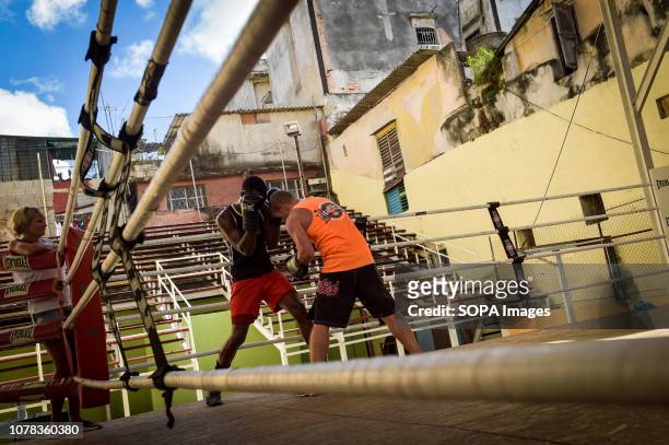 Boxers seen sparring in the ring at the Rafael Trejo training camp in Havana, Cuba. Cuban boxers are the most successful in the history of amateur...