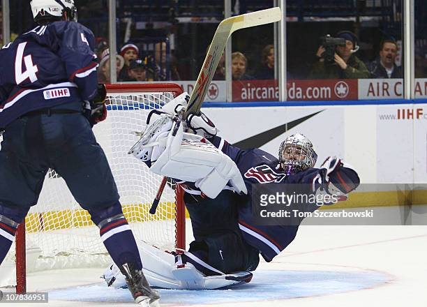 Goalie Jack Campbell of USA catches a loose puck during the 2011 IIHF World U20 Championship game between USA and Switzerland on December 31, 2010 at...