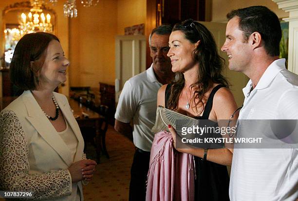 Australian Prime Minister Julia Gillard welcomes English captain Andrew Strauss and his wife Ruth during a cricket luncheon held at Kirribilli House...