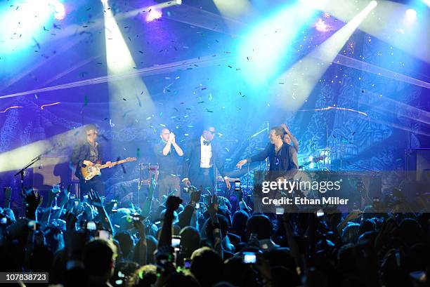 Rapper Jay-Z and Chris Martin of Coldplay perform onstage at The Cosmopolitan Grand Opening and New Year's Eve Celebration with Jay-Z and Coldplay at...