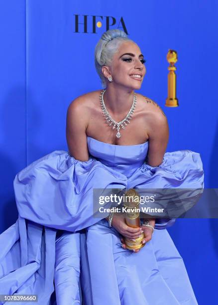 Winner for Best Original Song - Motion Picture for 'Shallow - A Star is Born' Lady Gaga poses with the trophy in the press room during the 76th...