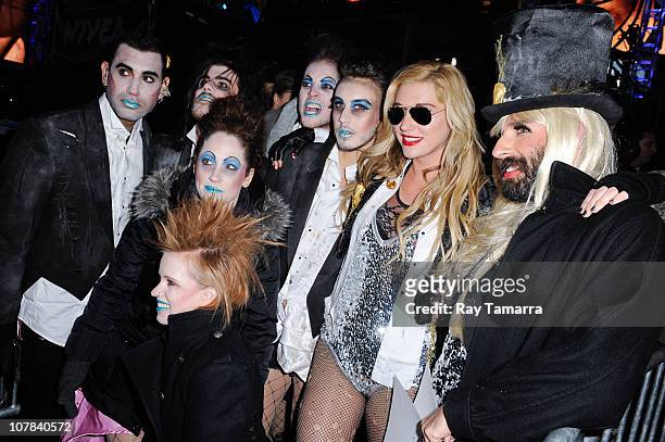 Singer Ke$ha and her band pose for photos at the New Year's Eve 2011 in Times Square on December 31, 2010 in New York City.