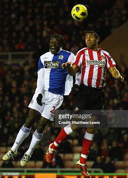 Mwaruwari Benjani of Blackburn and Anton Ferdinand of Sunderland challenge for the ball during the Barclays Premier League match between Sunderland...