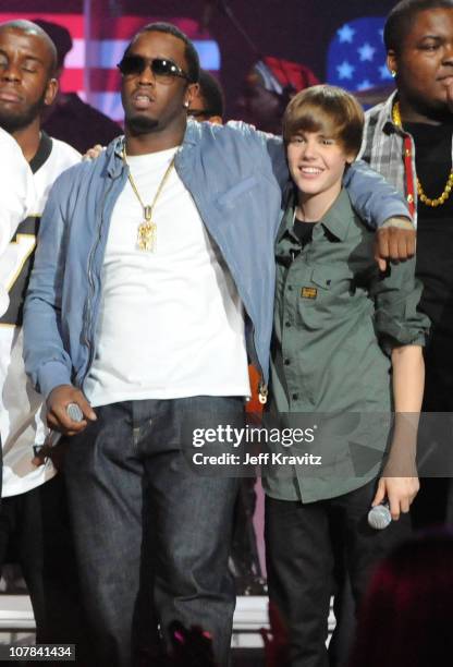 Sean "Diddy" Combs and Justin Bieber perform at the BET-SOS Saving Ourselves Help for Haiti Benefit Concert at AmericanAirlines Arena on February...