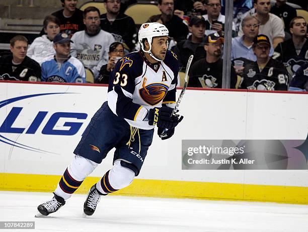 Dustin Byfuglien of the Atlanta Thrashers skates against the Pittsburgh Penguins at Consol Energy Center on December 28, 2010 in Pittsburgh,...