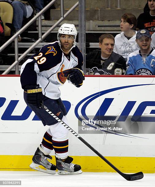 Johnny Oduya of the Atlanta Thrashers skates against the Pittsburgh Penguins at Consol Energy Center on December 28, 2010 in Pittsburgh, Pennsylvania.