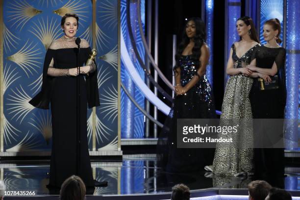 In this handout photo provided by NBCUniversal, Olivia Colman from “The Favourite” accepts the Best Actress in a Motion Picture – Musical or Comedy...