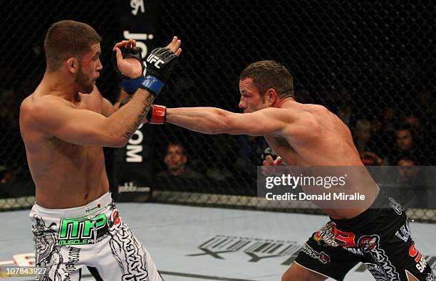 Marcus Davis punches towards Jeremy Stephens at UFC 125: Resolution at the MGM Grand Garden Arena on January 1, 2011 in Las Vegas, Nevada.