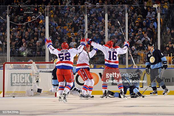 Eric Fehr of the Washington Capitals celebrates with his teammates after scoring a goal against the Pittsburgh Penguins in the 2nd period during the...