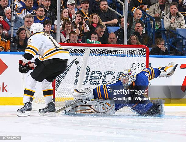 Tyler Seguin of the Boston Bruins scores a goal in the shootout against Ryan Miller of the Buffalo Sabres at HSBC Arena on January 1, 2011 in...