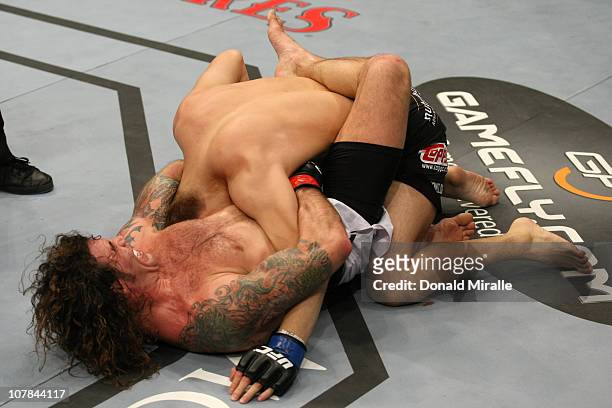 Clay Guida defeats Takanori Gomi by guillotine choke submission at UFC 125: Resolution at the MGM Grand Garden Arena on January 1, 2011 in Las Vegas,...