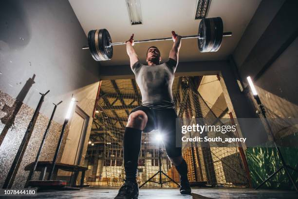 |hard weightlifting training in gym - deadlift stock pictures, royalty-free photos & images