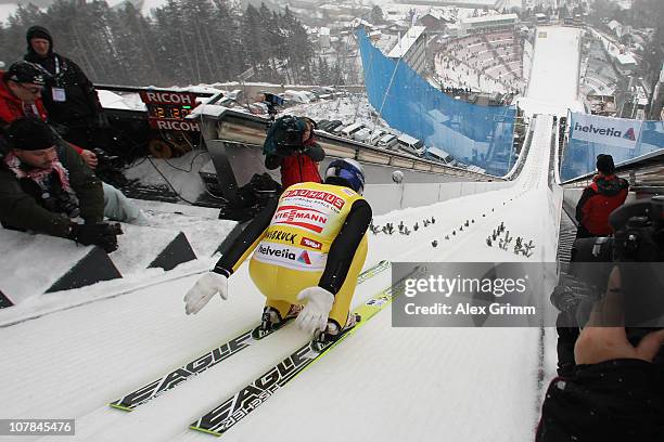 Thomas Morgenstern of Austria competes during the training for the FIS Ski Jumping World Cup event of the 59th Four Hills ski jumping tournament at...