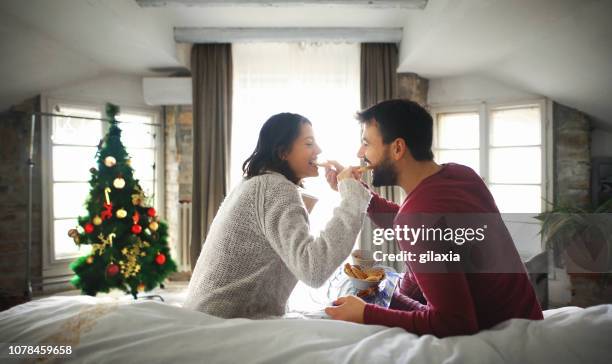peaceful christmas morning. - winter breakfast stock pictures, royalty-free photos & images