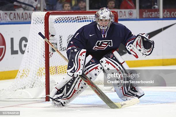 Goalie Jack Campbell of USA protects the goal during the 2011 IIHF World U20 Championship game between USA and Switzerland on December 31, 2010 at...