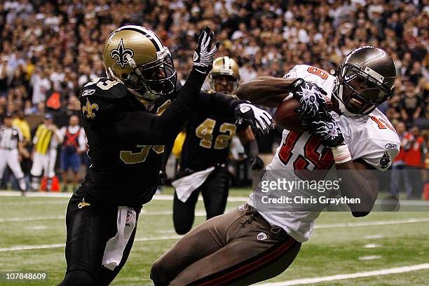 Mike Williams of the Tampa Bay Buccaneers catches a touchdown pass over Jabari Greer of the New Orleans Saints at the Louisiana Superdome on January...