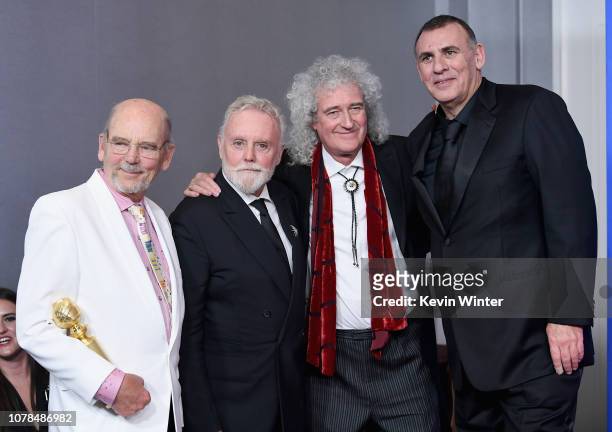 Best Motion Picture Drama Award Winners for 'Bohemian Rhapsody' producers Jim Beach , Graham King , Brian May pose in the press room during the 76th...