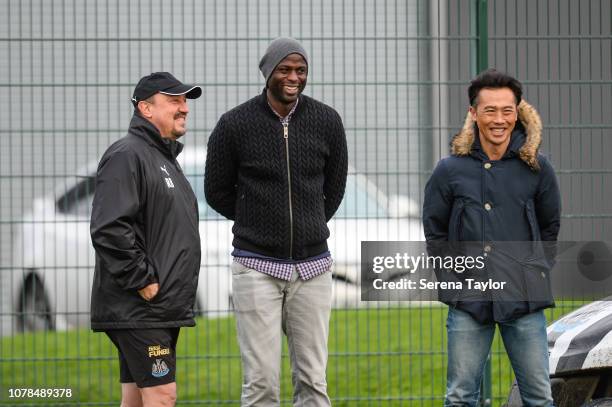 Former Liverpool Defender and current Seattle Sounders assistant coach Djimi Traore poses for a photo with Newcastle United Manager Rafael Benitez...