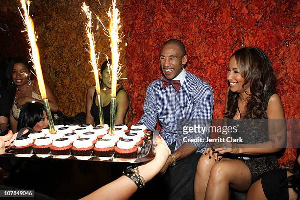 Valeisha Butterfield and Indiana Pacer Dahntay Jones celebrate his 30th birthday party at Greenhouse on January 1, 2011 in New York City.