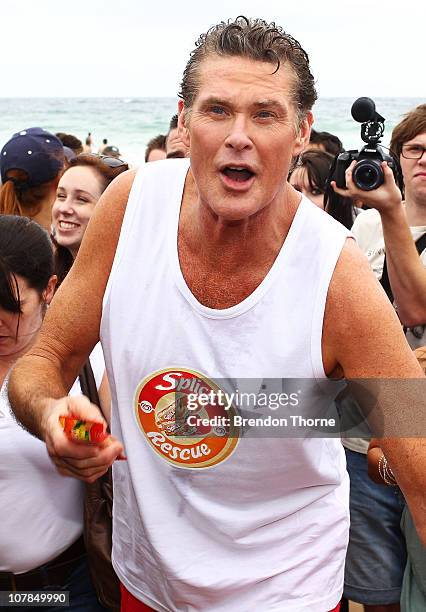 Star of Baywatch David Hasselhoff patrols the beach to promote the new "Splice Real Fruit" ice block at Bondi Beach on January 3, 2011 in Sydney,...