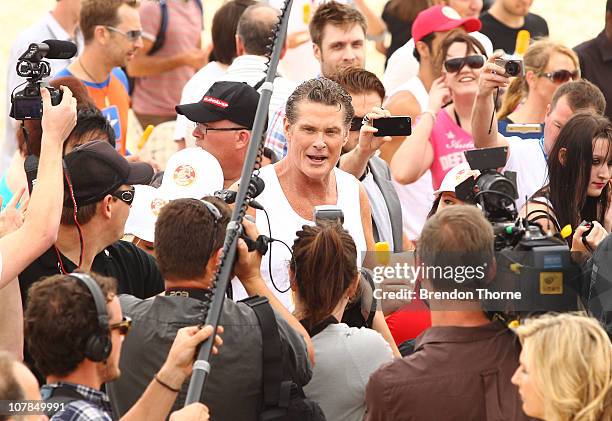 Star of Baywatch David Hasselhoff patrols the beach to promote the new "Splice Real Fruit" ice block at Bondi Beach on January 3, 2011 in Sydney,...