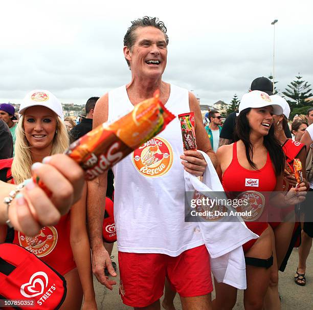 Star of Baywatch David Hasselhoff patrols the beach to promote the new "Splice Real Fruit" ice block at Bondi Beach on January 3, 2011 in Sydney,...