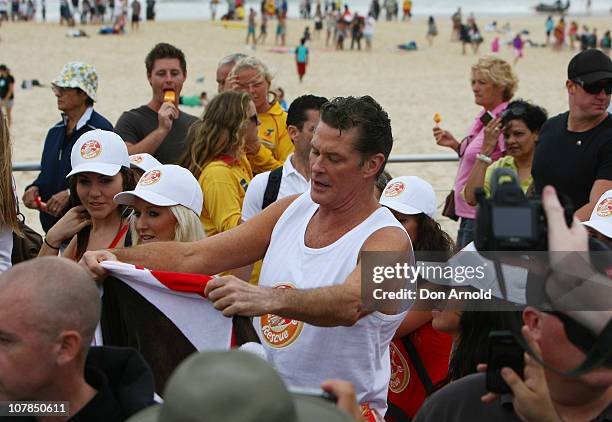 Star of Baywatch David Hasselhoff patrols the beach to promote the new "Splice Real Fruit" ice block at Bondi Beach on January 3, 2011 in Sydney,...