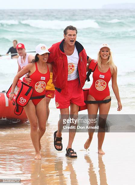 Star of Baywatch David Hasselhoff patrols the beach to promote the new "Splice Real Fruit" ice block at Bondi Beach on January 3, 2011 in Sydney,...