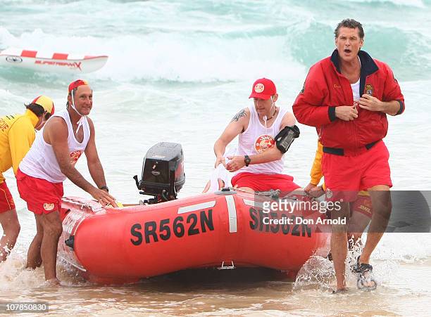 Star of Baywatch David Hasselhoff patrols the beach to promote the new "Splice Real Fruit" ice block at Bondi Beach on January 3, 2011 in Sydney,...
