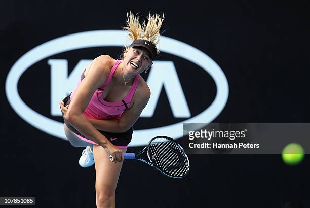 Maria Sharapova of Russia plays a serves during her match against Alberta Brianti of Italy during day one of the ASB Classic at ASB Tennis Centre on...