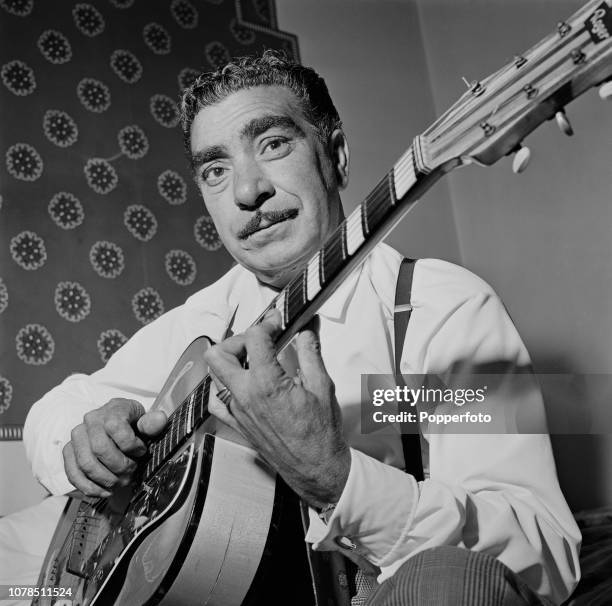 French jazz guitarist Joseph Reinhardt , younger brother of Django Reinhardt, pictured with his guitar in London in September 1960.