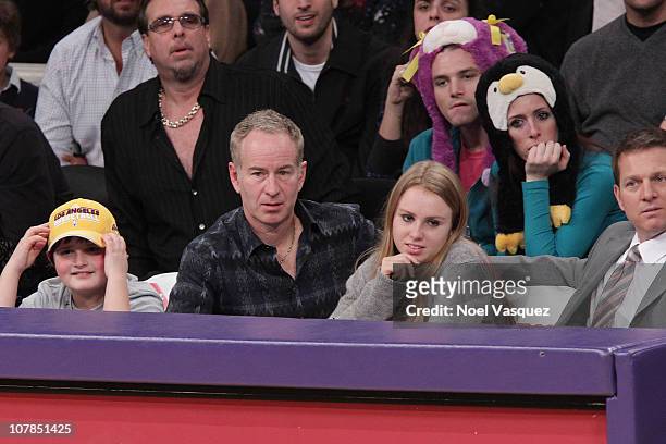 John McEnroe and his daughter Anna McEnroe attend a game between the Memphis Grizzlies and the Los Angeles Lakers at Staples Center on January 2,...