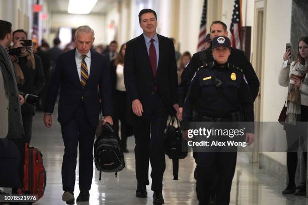 Former Federal Bureau of Investigation Director James Comey arrives at the Rayburn House Office Building before testifying to the House Judiciary and...