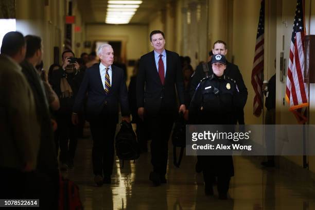 Former Federal Bureau of Investigation Director James Comey arrives at the Rayburn House Office Building before testifying to the House Judiciary and...