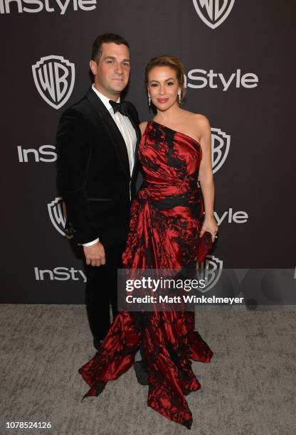 Dave Bugliari and Alyssa Milano attend the 2019 InStyle and Warner Bros. 76th Annual Golden Globe Awards Post-Party at The Beverly Hilton Hotel on...