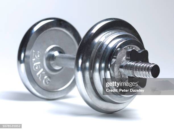 large dumbbells on white background - hand weight stock pictures, royalty-free photos & images