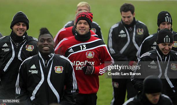 Michael Ballack warms up with team mates during a Bayer Leverkusen training session at BayArena training pitch on January 3, 2011 in Leverkusen,...
